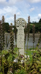 Beautiful Celtic cross overlooking the bay